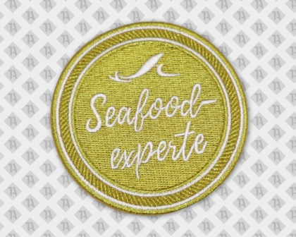 Runder Patch Aufnäher gestickt mit gestickten Rand metallic gold Seafood Experte Gastro